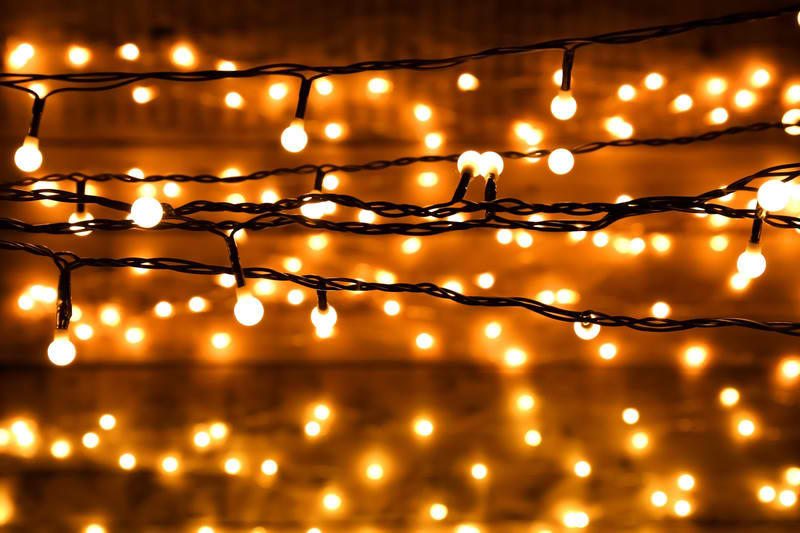 How To Hang Christmas Lights Without Damaging the Gutters